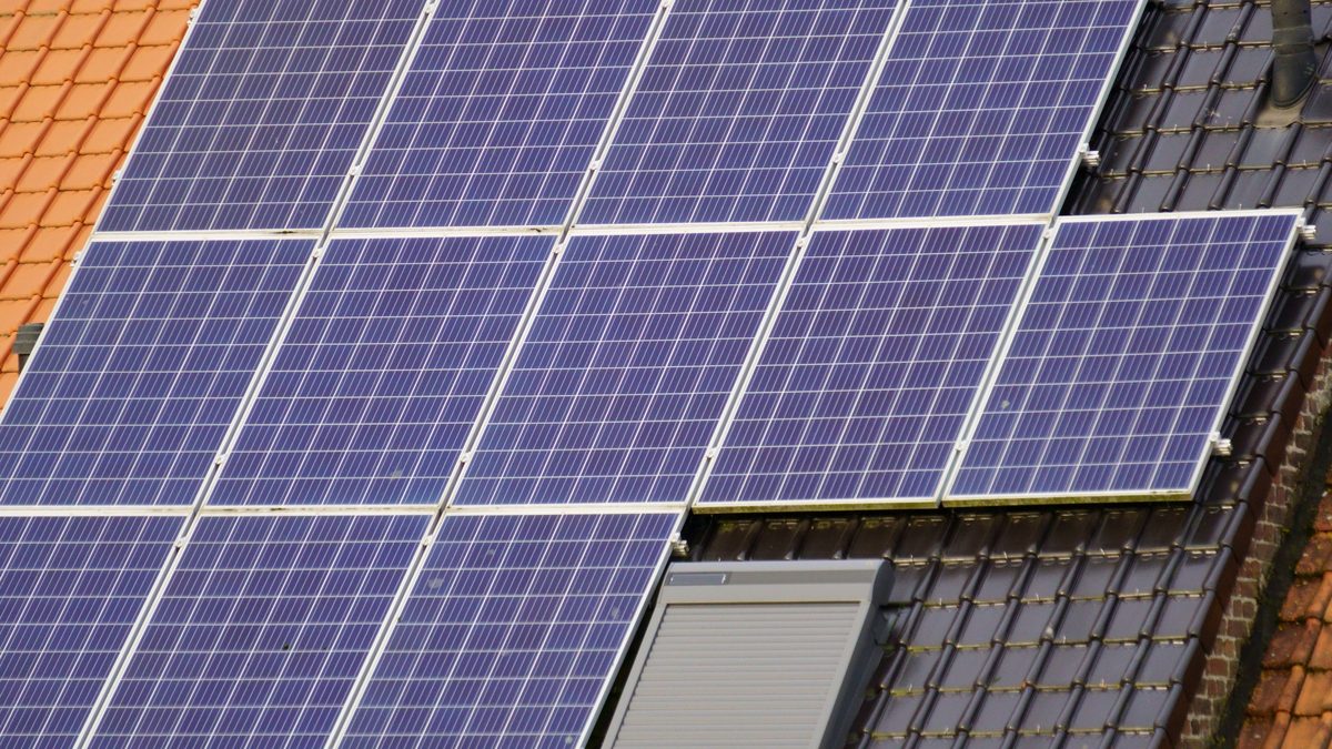 A rooftop 5kW solar array of monocrystalline panels on a tiled roof in Jordan